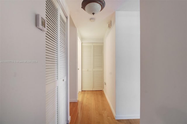 hallway featuring light hardwood / wood-style flooring