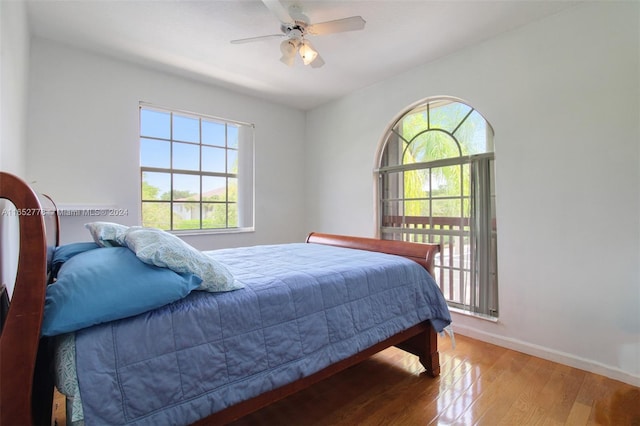 bedroom featuring ceiling fan and hardwood / wood-style floors