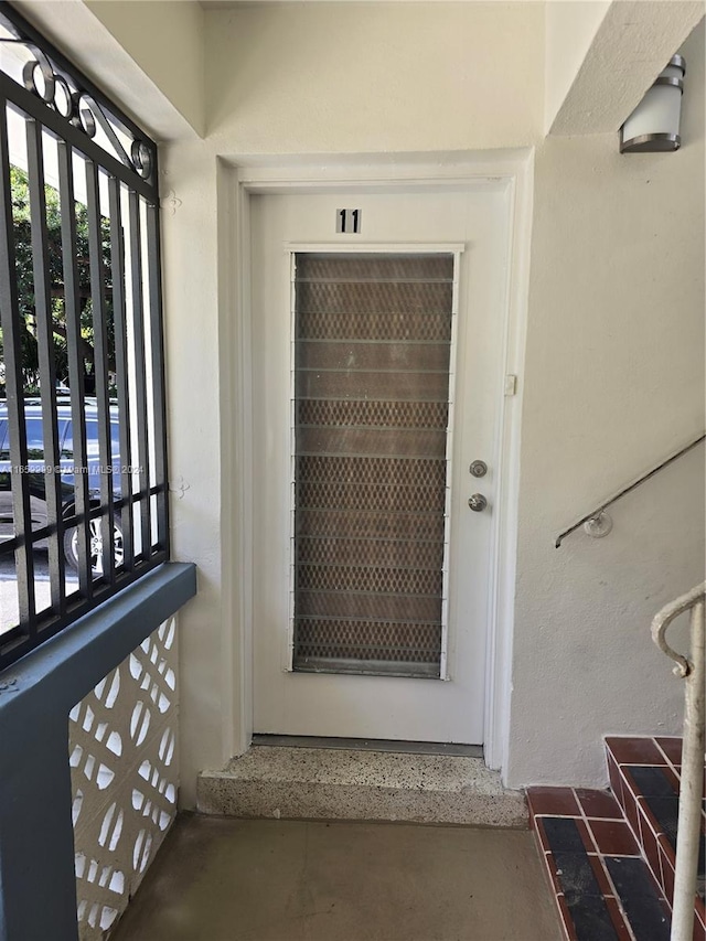 property entrance with a balcony