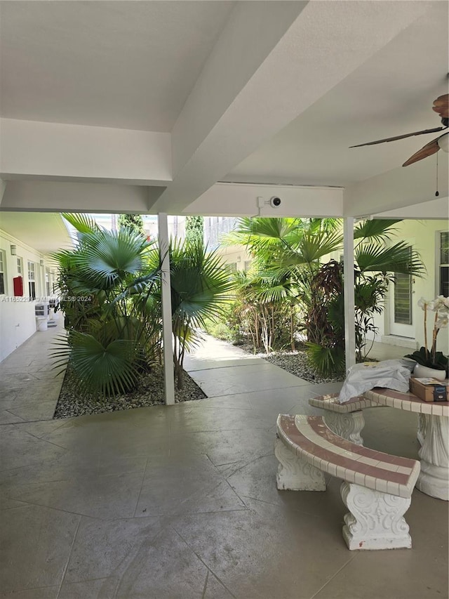 view of patio featuring a ceiling fan