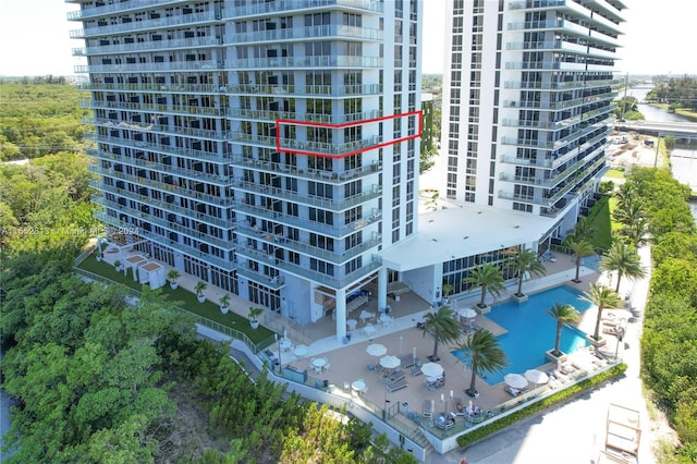 view of property featuring a community pool