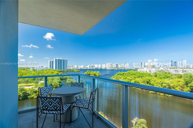 balcony featuring a water view