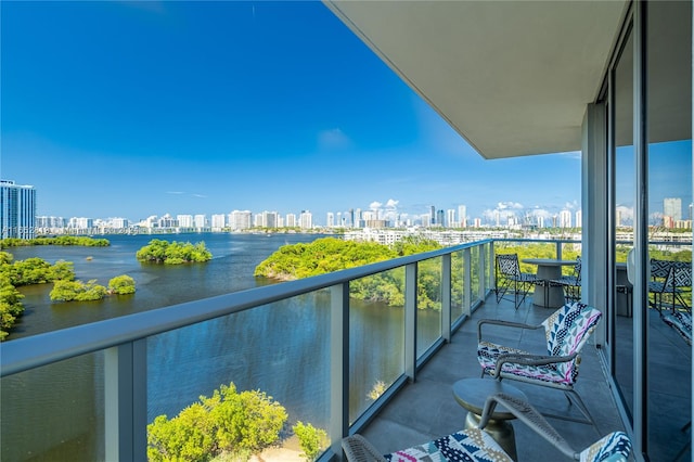 balcony featuring a water view