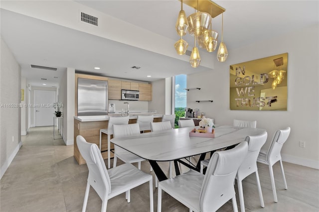 dining room with a notable chandelier