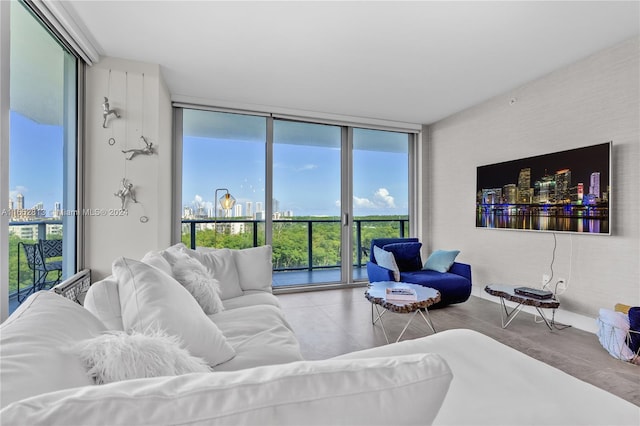 living room featuring floor to ceiling windows