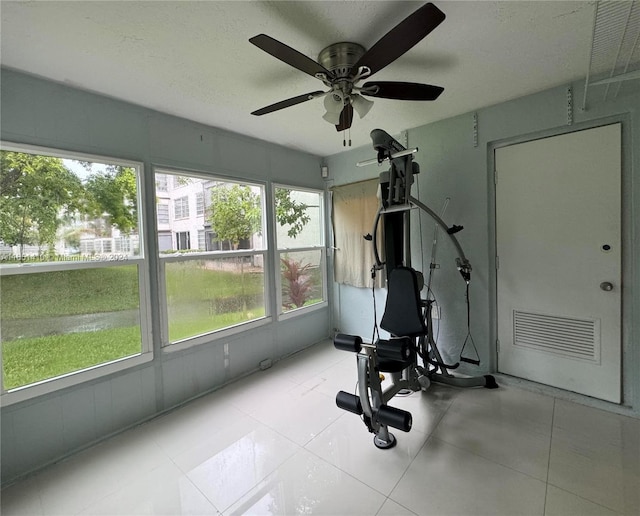 workout area featuring ceiling fan