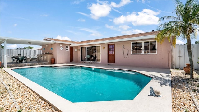 view of pool featuring a patio