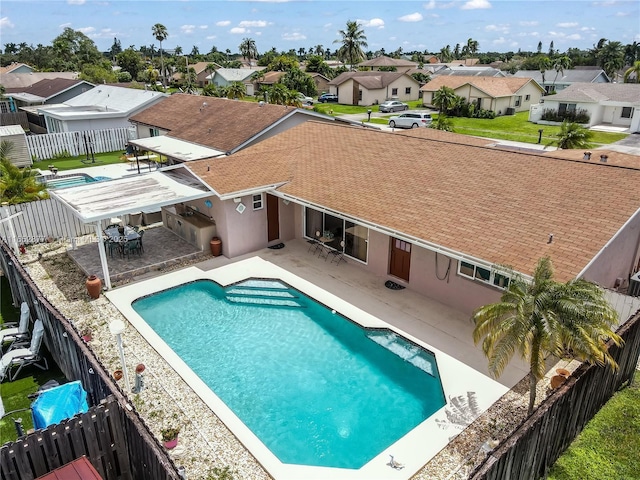 view of pool featuring a patio