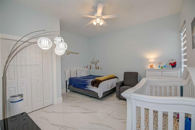 bedroom featuring a closet and ceiling fan