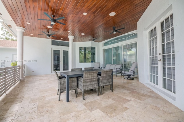 view of patio / terrace featuring french doors and ceiling fan