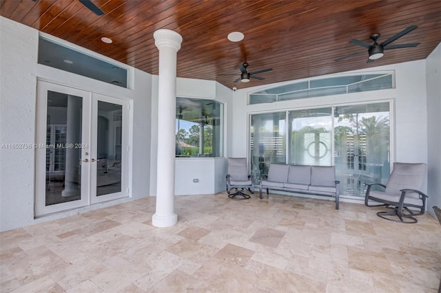 view of patio / terrace with french doors and ceiling fan