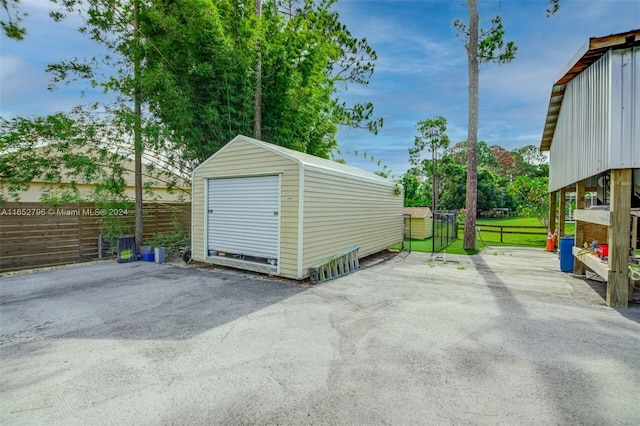 garage with a lawn