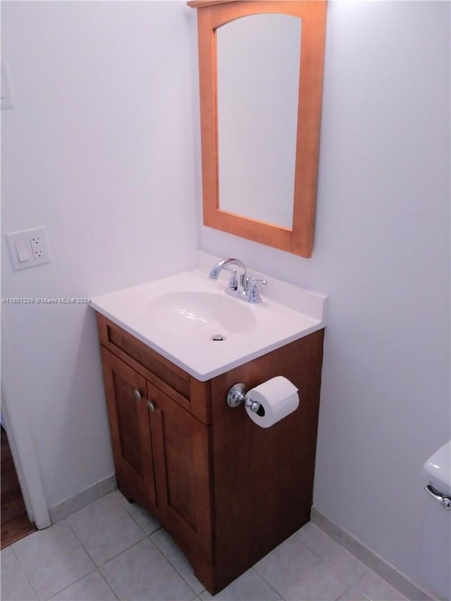 bathroom with vanity and tile patterned floors