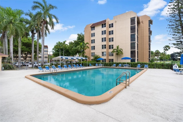 view of swimming pool featuring a patio