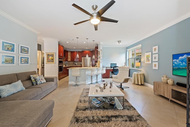 living room featuring crown molding, recessed lighting, a ceiling fan, light tile patterned flooring, and baseboards