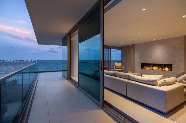 balcony at dusk with a water view