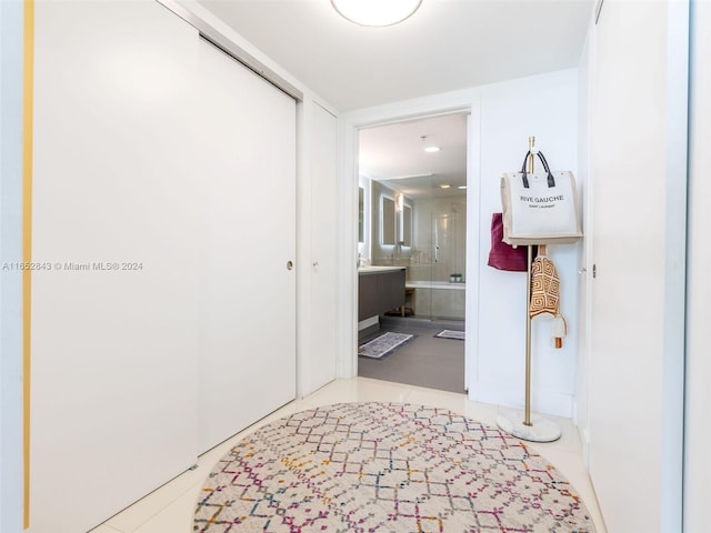 corridor with tile patterned flooring