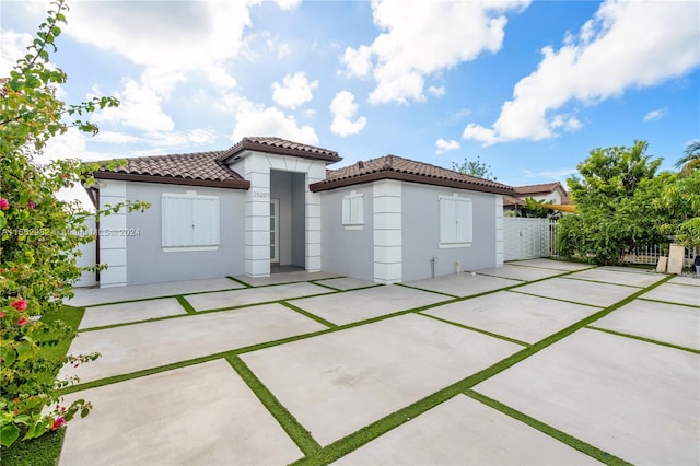 rear view of property with a patio