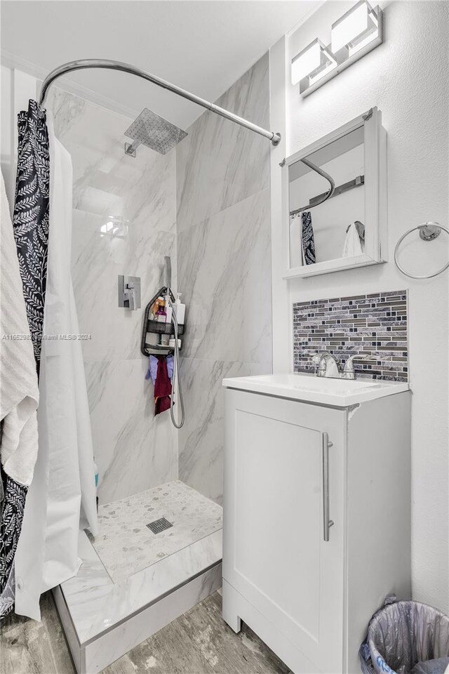 bathroom with vanity and a shower with curtain