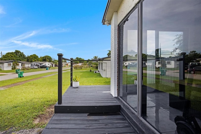 deck featuring a lawn