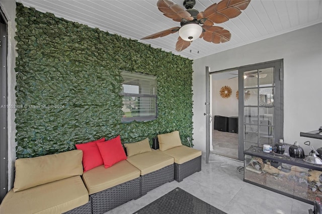 interior space featuring ceiling fan and outdoor lounge area