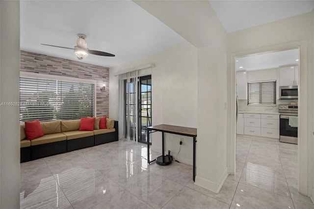 living room featuring ceiling fan