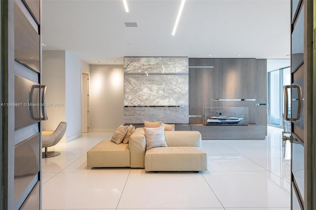 living room featuring light tile patterned flooring