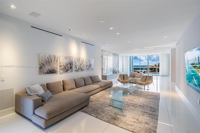 living room with light tile patterned floors