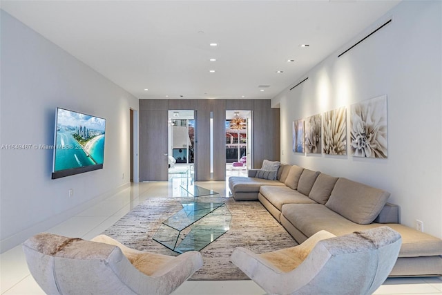 living room with light tile patterned flooring