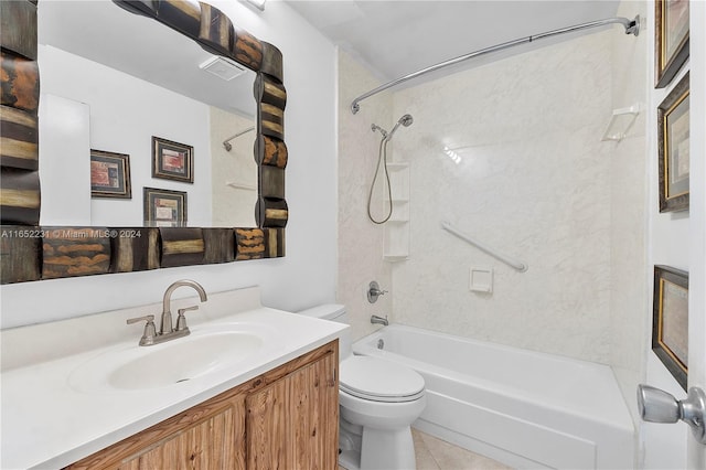 full bathroom featuring tile patterned flooring, tiled shower / bath, vanity, and toilet