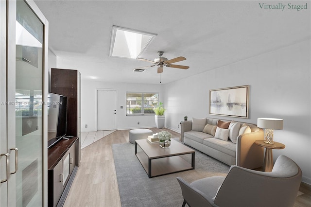 bedroom with light wood-type flooring and ceiling fan