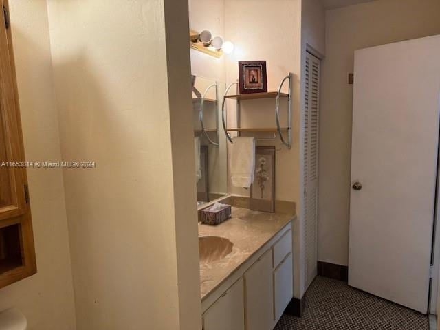 bathroom featuring vanity and tile patterned floors