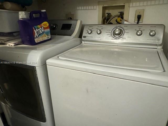 laundry area featuring washing machine and dryer