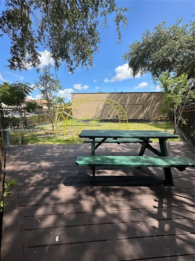 surrounding community featuring a wooden deck