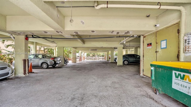 garage featuring a carport