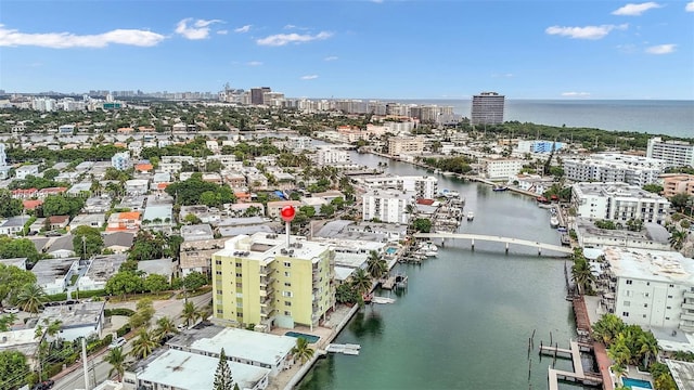 bird's eye view featuring a water view and a city view