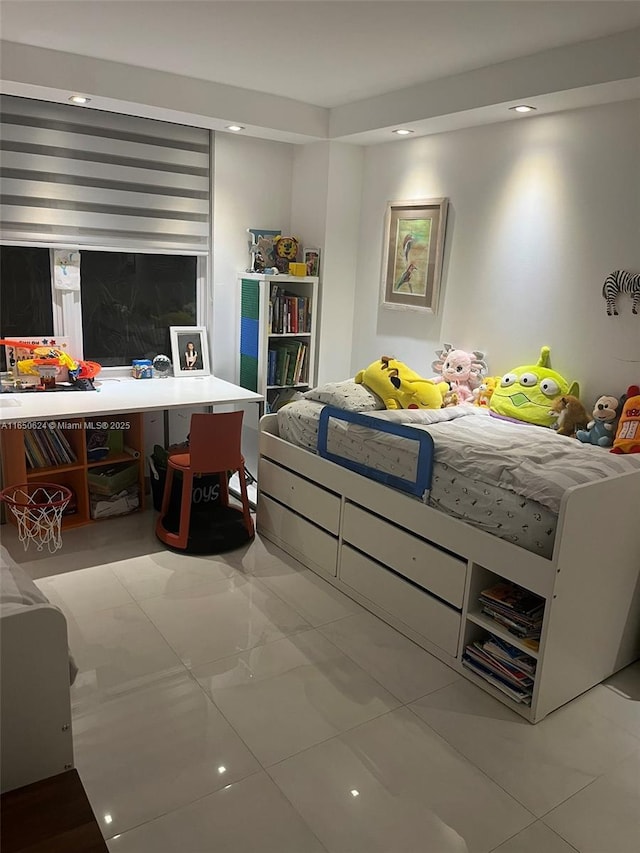 bedroom featuring light tile patterned floors