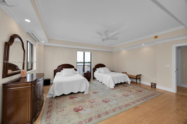 bedroom featuring ornamental molding, hardwood / wood-style flooring, ceiling fan, and access to outside