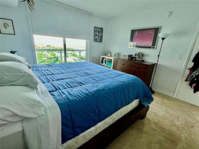 bedroom featuring light carpet