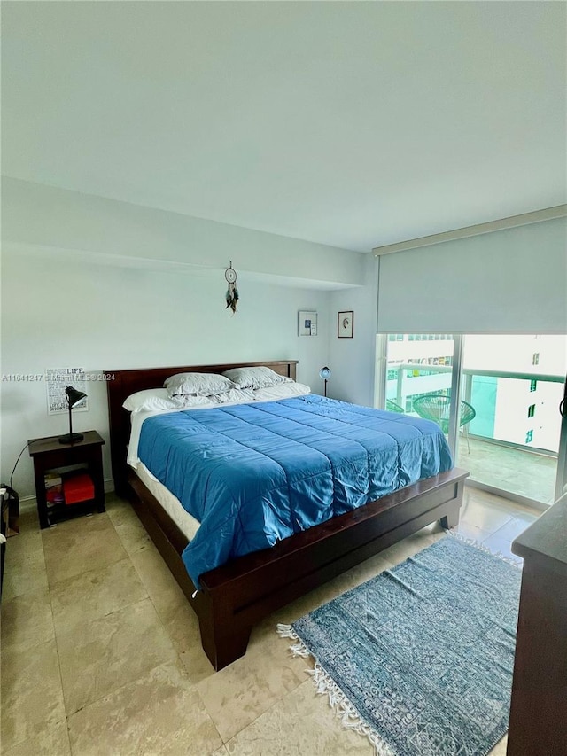 bedroom featuring access to outside