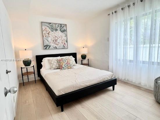 bedroom featuring hardwood / wood-style floors