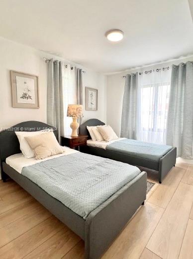 bedroom featuring light hardwood / wood-style floors