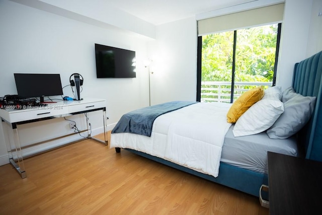 bedroom featuring hardwood / wood-style flooring