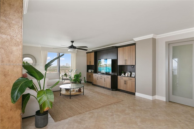 living room featuring light tile patterned floors, ornamental molding, and ceiling fan