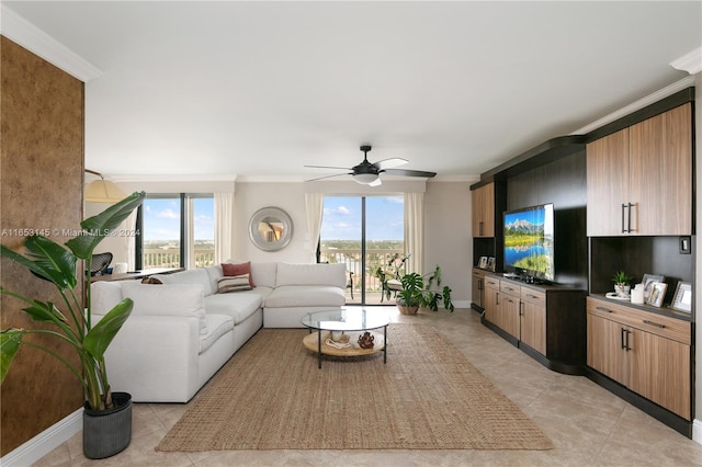 tiled living room with crown molding and ceiling fan