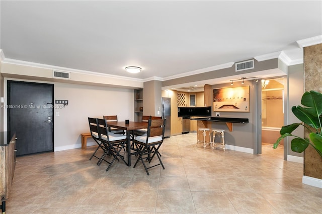1500 S Ocean Dr Unit 15A, Hollywood, FL 33019 - dining area with baseboards, crown molding, and visible vents