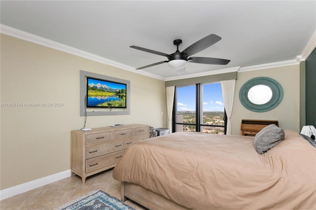 bedroom with ornamental molding and ceiling fan