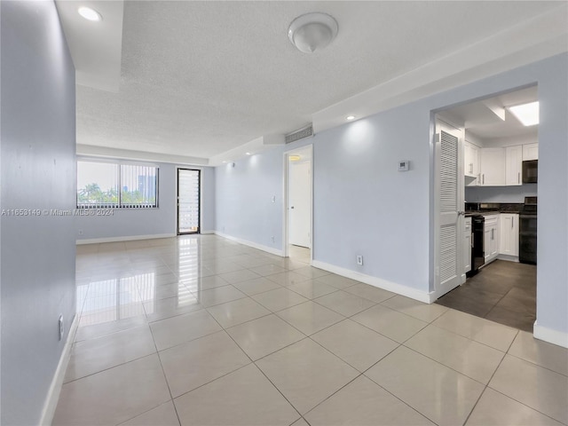 interior space featuring a textured ceiling