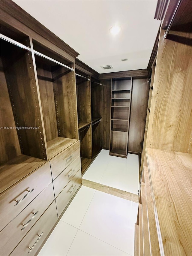 walk in closet featuring tile patterned floors