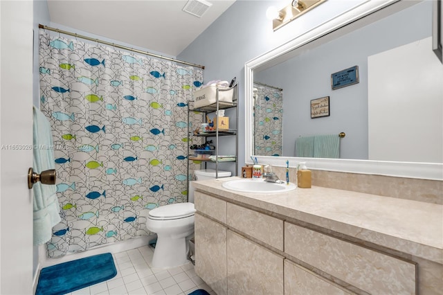 bathroom with vanity, toilet, a shower with shower curtain, and tile patterned flooring